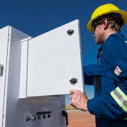 Service man checking flow monitor